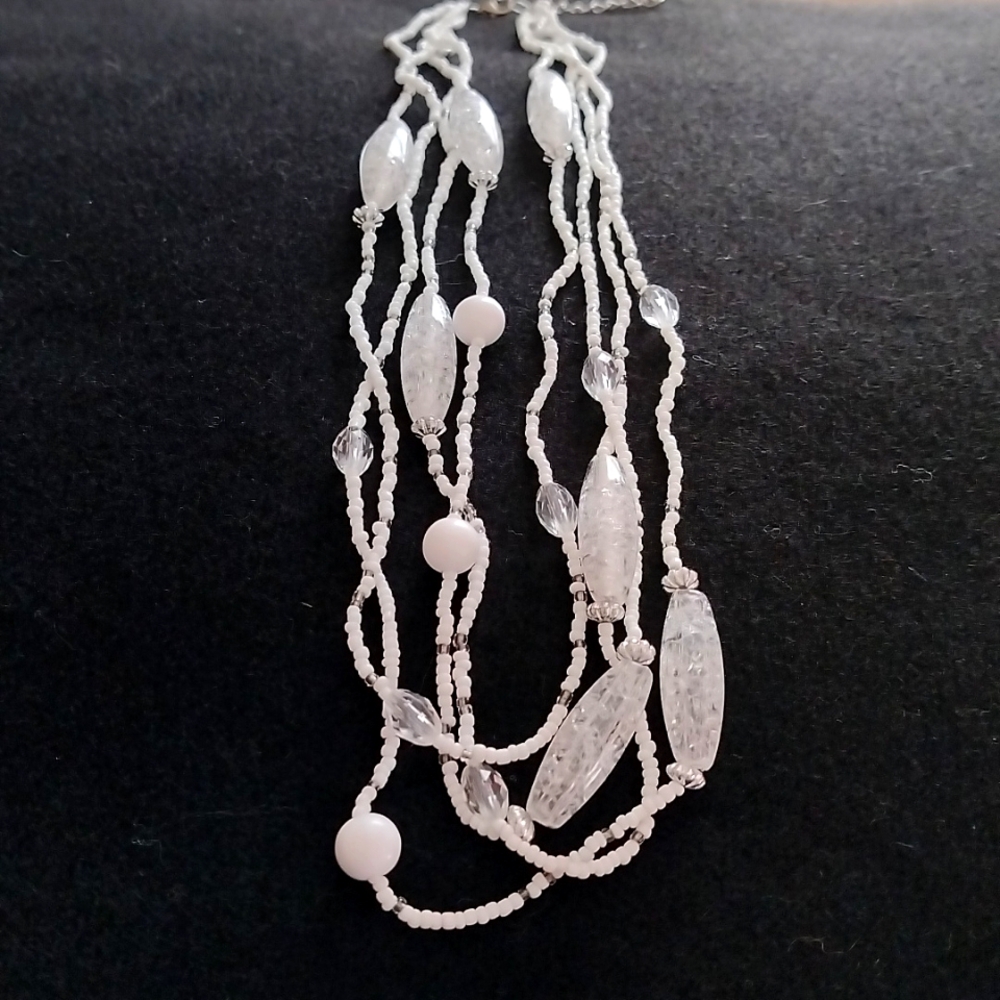 Vtg. Artisan hand crafted 4 strand different white beaded Necklace.